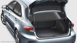While the rear seats do fold down, there is a large lip between the bottom of the trunk floor and folded seats, making it hard to load long items. Toyota Corolla Sedan Dimensions And Boot Space Hybrid
