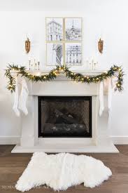 Candles in fireplace fake fireplace decorative fireplace fireplace ideas fireplace design electric fireplace faux fireplace insert fireplace. How To Hang Lighted Garland On The Mantel Video So Much Better With Age
