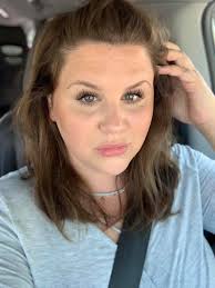 Creating a charcuterie board with various snacks and spreads