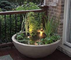 12 Soothing Diy Container Water Feature Projects Water Gardens Diy Water Features In The Garden Patio Water Feature