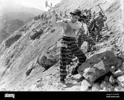 chain gang" Black and White Stock Photos & Images - Page 2 - Alamy