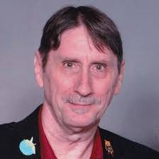 This is me without a costume. I just turned 71