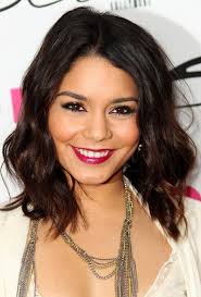 This is quite an effortless, playful style that you could fluff with your fingertips or tuck behind one ear. Vanessa Hudgens Medium Curly Hair Style Hairstyles Weekly