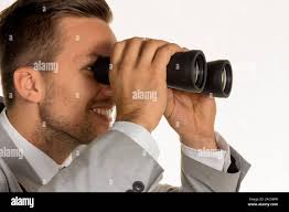 With binoculars hi-res stock photography and images