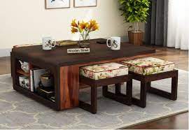 The coffee table has always been that functional piece of furniture in the living room to put your cup of tea, coffee and a snack on. Coffee Center Table Buy Latest Designer Coffee Table Online Best Price Wooden Street