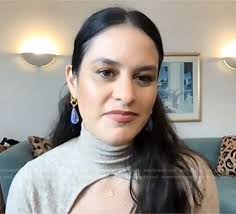 WornOnTV: Donna Farizan's beige cutout turtleneck sweater