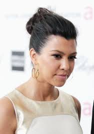 Updo hairstyles allow creating an elegant look without dramatic shifts. Kourtney Kardashian Black Casual Loose Bun Updo Hair Style Hairstyles Weekly Casual Hair Updos Hair Styles Stylish Hair