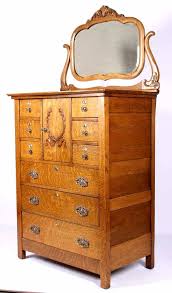 A simple formula to use when decorating the top of a dresser or chest of drawers. Antique Oak High Boy Dresser With Mirror