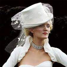 Stylish Bride Pairs A White Top Hat White Netting Veil Outfits With Hats Wedding Hats Beautiful Hats