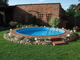 Impressive 36 Amazing Ground Pool Landscaping Ideas Above Ground Pool Landscaping Backyard Pool Landscaping Round Pool