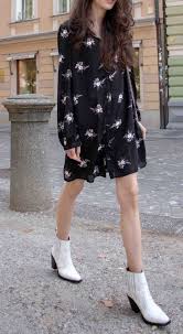 Wearing a floral dress with floral shoes might seem like a risky move, but the mixture of different patterns and prints is an art form, but it's really not too hard to master. How To Wear Western Boots Floral Shirtdress Brunette From Wall Street Fashion Dresses With Cowboy Boots How To Wear