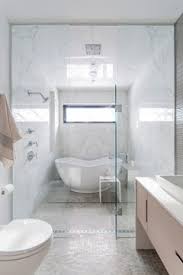 One leads directly to a toilet and bidet. Shower Over Freestanding Bath Without A Curtain Is My Plan Logical Houzz Uk