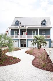 You don't need to have a beach theme in your home to paint with calm coastal colors. Modern Beach House Exterior Paint Colors Novocom Top