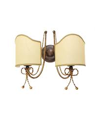 Struttura in ferro battuto marrone con pennellature oro, diffusori in vetro di murano e particolari in ceramica lavorata a mano. Applique Classico In Ferro Battuto 2 Luci Fiocco