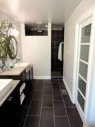 While it's most popular on walls, subway tile floors are on. 15 Best Black Bathroom Floor Ideas Bathrooms Remodel Bathroom Flooring Bathroom Inspiration