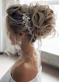 This wedding hairstyles updo is a simple but elegant man bun combined with a neatly trimmed beard that gives off an air of sophistication that will fit in with any style of wedding. 10 Charming Bridesmaid Hairstyles Ideas You Can Try Fashions Nowadays Summer Wedding Hairstyles Wedding Hairstyles For Long Hair Long Hair Styles