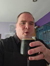 Thick, syrupy beer with chocolate and port flavors