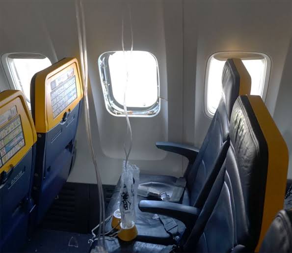 A jet engine fan blade cut into a plane and caused a passenger to be  partially sucked out of a window, the NTSB says | CNN