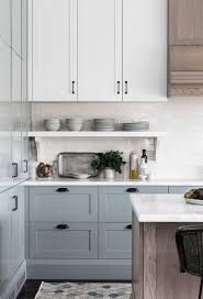 Soft Blue Gray Kitchen Cabinets Are So Stunning And Love The Mix Of Painted Cabinets With Wood In 2020 Blue Gray Kitchen Cabinets Grey Kitchen Cabinets Kitchen Design