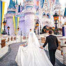 Disney Wedding Portrait Session At Magic Kingdom During The Holidays Disney Wedding Dresses Disney Fairy Tale Weddings Disney World Wedding