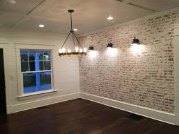 Faux brick wall in progress. How To Build A Faux Brick Wall The Restoring House Faux Brick Walls Brick Interior Wall Brick Wall Paneling