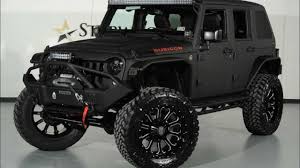 Visit our showroom to see our fully custom and lifted jeep inventory. 2014 Jeep Wrangler Unlimited Rubicon Fastback Kevlar Coated Flipboard