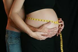 You could even buy a special tape measure and jot down the weeks and other notes directly on it as a keepsake. A Couple S Love Baby Bump With Measuring Tape In Color Photograph By Melissa Kimball