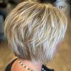 Blunt bangs should be cut thick and heavy with no thinning. 1