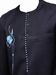 The agbada, baban riga or grand boubou (bubu) as its fondly called in many parts of africa especially in. Buy Black With Light Blue Embroidery Design African Men Attire Afric Online At Afrizar