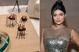 She wore a long red wig and sunglasses to finish off the look. Kylie Jenner Brings Out Her Spooky Halloween Decorations People Com