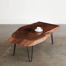 For this table, we're using a slab of black walnut from a local architectural salvage. Walnut Slab Coffee Table With Black Hairpin Legs For Apartment Elko Hardwoods Modern Live Edge Furniture Dining Coffee Tables Desks Benches