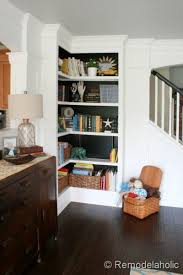 Find pricing to install bookshelves against a wall or around a fireplace. Remodelaholic Build A Wall To Wall Built In Desk And Bookcase