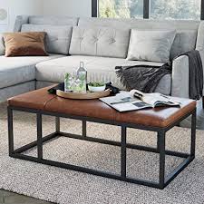 Square poufs double as ottomans and side tables—use a coffee table tray to beverages and snacks in front of the tv. Amazon Com Nathan James Nelson Coffee Table Ottoman Living Room Entryway Bench With Faux Leather Tuft Iron Frame Warm Brown Black Home Kitchen