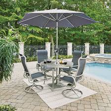 Home Styles Furniture South Beach 7 Piece Round Outdoor Dining Table With 4 Swivel Rocking Round Outdoor Dining Table Outdoor Dining Chairs Outdoor Dining Set