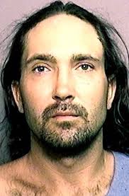 Suspect breaks officer's window