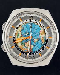 Gehäuse und zifferblatt gold 18 k gehäuserand gerändelt, deckelränder und werkdeckel floral verziert, bodendeckel guillochiert. World Timer Gmt A La Clinique Horlogere Reparation Et Vente De Montres Porrentruy Jura Suisse