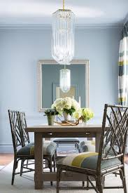 Each dining chair is upholstered in a light blue faux linen fabric and features a reclaimed finish on the solid wood legs, for a charming farmhouse look. Pale Blue Dining Chairs Design Ideas