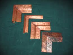 A beautiful, shiny, copper picture frame. Rustic Hand Hammered Copper Mirror
