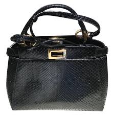 It appears on their fifth studio album oh, no! Fendi Bags Fendi Peekaboo Mini Black Exotic Python Handbag Poshmark