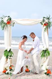 Elegant Beach Wedding Under An Elegant Canopy Cocoa Beach Florida Www Romanticfloridabeachweddi Wedding Beach Ceremony Beach Wedding Beach Wedding Packages