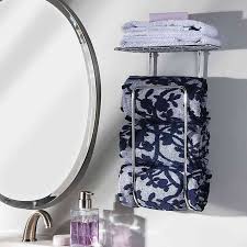The tapered curves and graceful arcs of thethe tapered curves and graceful arcs of the delta porter bath collection are reminiscent of classic architectural forms. Interdesign Classico Steel Wall Mounted Towel Holder In Chrome Bed Bath Beyond Wall Mounted Towel Holder Towel Holder Bathroom Towel Storage