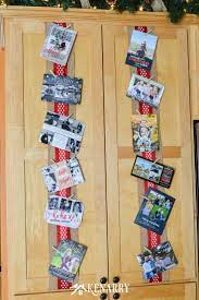 You can use ribbon and clothespins, snap them together with metal rings, or pin them around the doorways within your homes. Displaying Christmas Cards On Ribbon On Kitchen Cabinets