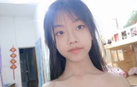 Girls wooden stick doll thrusting water