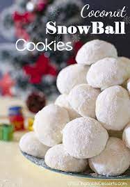 Cocoa powder, peanut butter, oats, coconut oil. Christmas Coconut Snowball Cookies With Coconut And Powdered Sugar