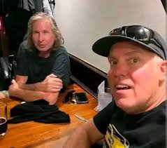 Humorous reactions to a car with a large rear wing