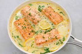 Pan Fried Salmon With Creamy Garlic Sauce Chef Sheilla The Soulful Kitchen Diva