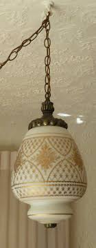 Maybe you would like to learn more about one of these? Vintage Gold Painted White Satin Glass Hanging Swag Pendant Light Lamp Hollywood Regency Flower Floral Diamond Quilted Pattern Works Swag Pendant Light Pendant Light Gold Paint