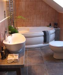 Wet rooms are practical and can be visually stunning. Decorating Tips For Smaller En Suite Bathrooms