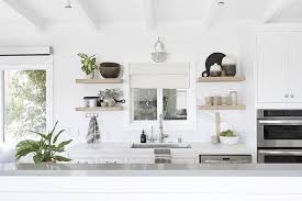Our custom shelves are available in a variety of styles & sizes to match any decor. White Beach Cottage Kitchen With Gray Wash Oak Floating Shelves Cottage Kitchen