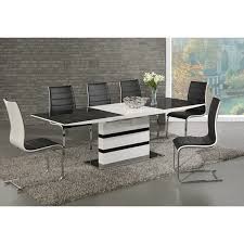 A formal table and chairs will add an elegant look to your space. Arctic Black Glass And White High Gloss Extending Dining Table Set Furniture Mill Outlet